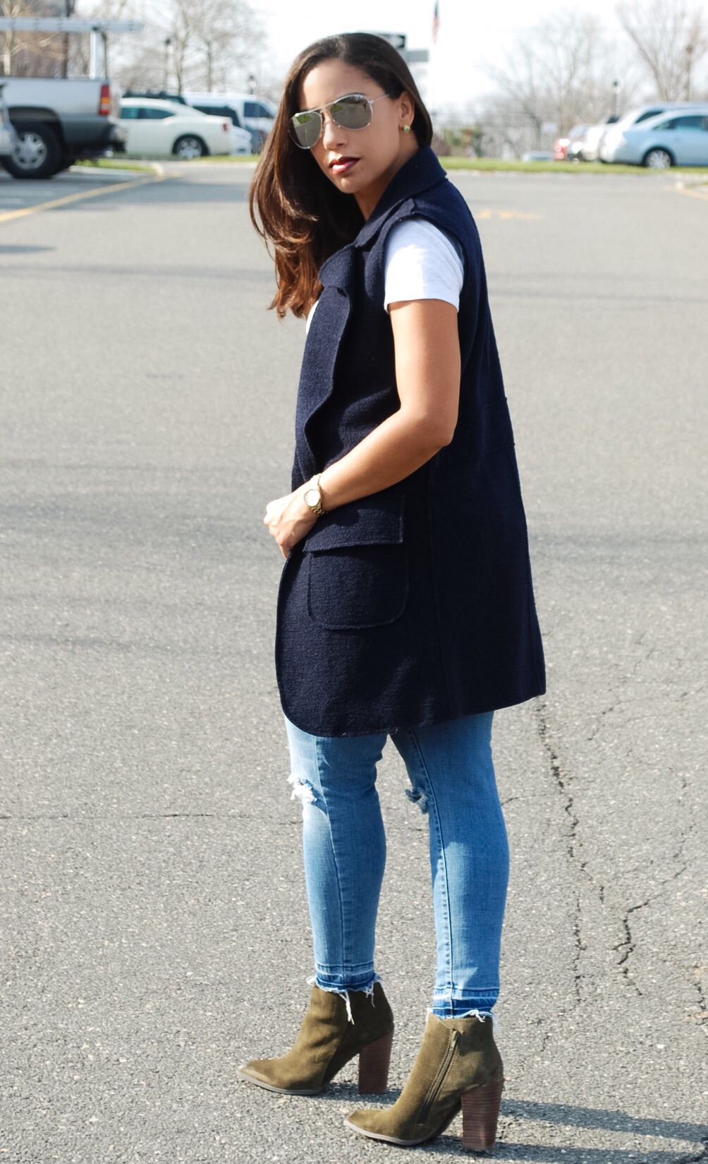 Navy vest and ankle boots